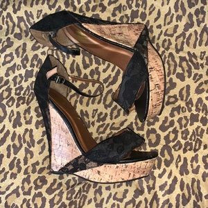 Woman’s Black Lace Wedges